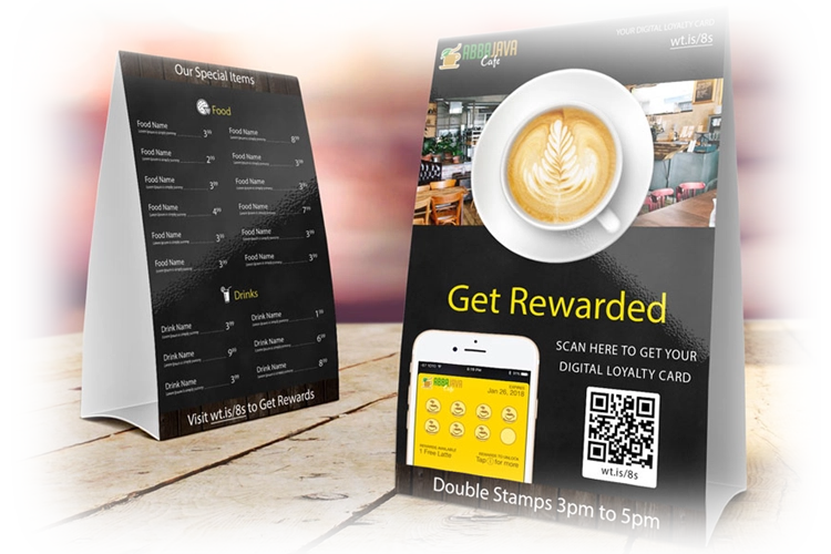 Loyalty-program tent card beside a café menu