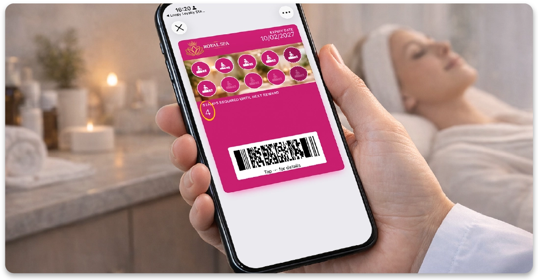 Digital health and
wellness loyalty card displayed on a smartphone during a spa treatment